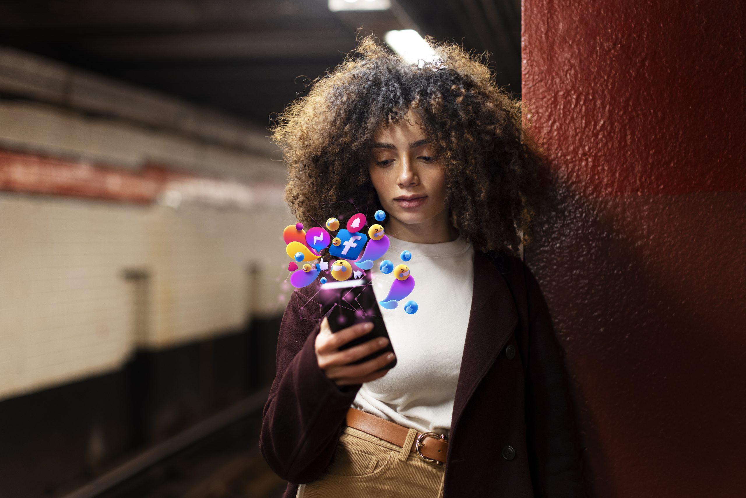 A women using a phone with social media icons around (Facebook, Instagram, TikTok).